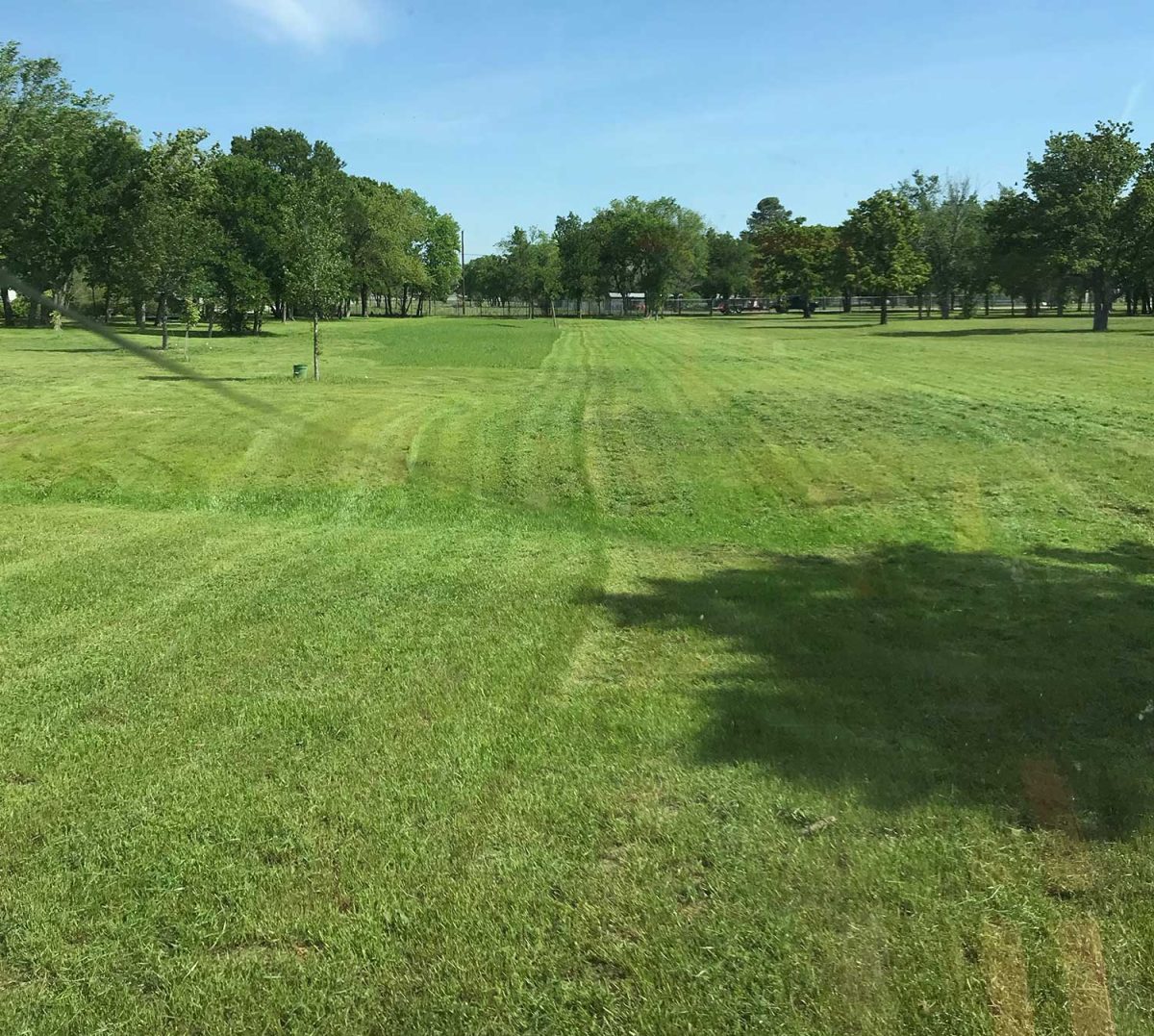 mowing baseball field grass